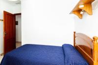 A bed or beds in a room at Luminoso apartamento en Cadiz