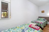 Postel nebo postele na pokoji v ubytování Casa Carlos con Piscina Privada en Conil