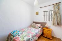 Postel nebo postele na pokoji v ubytování Casa Carlos con Piscina Privada en Conil