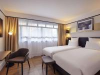 Ein Bett oder Betten in einem Zimmer der Unterkunft Mercure Paris Saint-Ouen