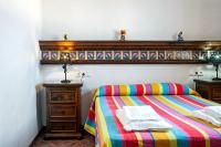 A bed or beds in a room at Cortijo Villa La Dehesa