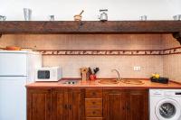A kitchen or kitchenette at Cortijo Villa La Dehesa