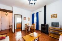 Televízia a/alebo spoločenská miestnosť v ubytovaní Chalet Bellavista