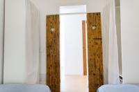Postel nebo postele na pokoji v ubytování Villa Jodie