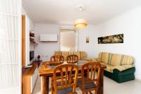 A seating area at Luminoso apartamento en Cadiz
