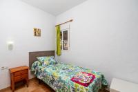 Postel nebo postele na pokoji v ubytování Casa Carlos con Piscina Privada en Conil