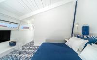 A bed or beds in a room at Maison Il Conservatorio