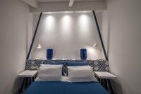 A bed or beds in a room at Maison Il Conservatorio