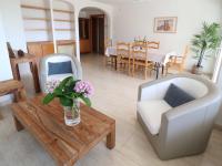 Posezení v ubytování Urcatusa Llevant - Apartamento 6 pax con piscina g27034