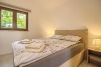 Postel nebo postele na pokoji v ubytování Beautiful villa Irma with private pool near Rovinj