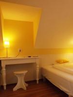 Łóżko lub łóżka w pokoju w obiekcie Villa Sipeky