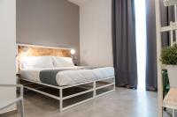 Posteľ alebo postele v izbe v ubytovaní Residence Hotel Moderno