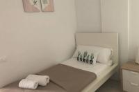 Posteľ alebo postele v izbe v ubytovaní CITY CENTER BIG APARTMENT-FAMILY & FRIENDS-5 Beds