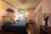 A bed or beds in a room at Casa Salomone