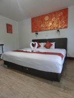 Postel nebo postele na pokoji v ubytování The Krabi Forest Homestay