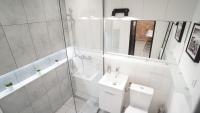 Kúpeľňa v ubytovaní Apartament Akali Centrum -Parking
