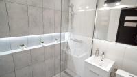 Kúpeľňa v ubytovaní Apartament Akali Centrum -Parking