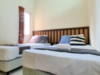 Gold Coast Morib Studio l Apartment I Penthouseにあるベッド