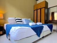 Gold Coast Morib Studio l Apartment I Penthouseにあるベッド