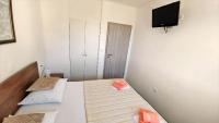 Postel nebo postele na pokoji v ubytování Apartment Ribnjak 10