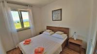 Postel nebo postele na pokoji v ubytování Apartment Ribnjak 10
