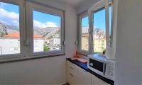 Kuchyň nebo kuchyňský kout v ubytování Apartment Ribnjak 10