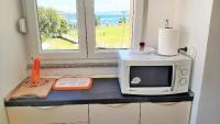 Kuchyň nebo kuchyňský kout v ubytování Apartment Ribnjak 10