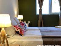 SKYLER GUEST HOUSEにあるベッド