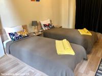 SKYLER GUEST HOUSEにあるベッド
