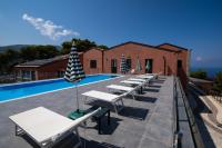 The swimming pool at or close to "Il Segreto" Vista Panoramica sulle Isole Eolie con Piscina, palestra e WiFi