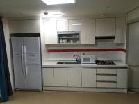 Hotel Joy near Camp Humphresにあるキッチンまたは簡易キッチン