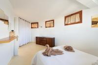 Postel nebo postele na pokoji v ubytování Villa Taguluche Famara