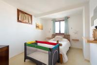 Postel nebo postele na pokoji v ubytování Villa Taguluche Famara