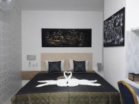 Postel nebo postele na pokoji v ubytování B&B NAMO PHUKET