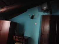 A television and/or entertainment centre at Hostal Venta Liara