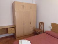 Postel nebo postele na pokoji v ubytování PENSION MIRAFLORES