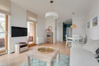 Telewizja i/lub zestaw kina domowego w obiekcie Gdansk Comfort Apartments Bursztynowa