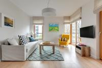 Telewizja i/lub zestaw kina domowego w obiekcie Gdansk Comfort Apartments Bursztynowa