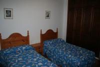 Postel nebo postele na pokoji v ubytování Apartamentos Sierra del Hacho
