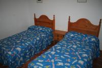 Postel nebo postele na pokoji v ubytování Apartamentos Sierra del Hacho