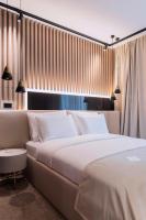 Posteľ alebo postele v izbe v ubytovaní Pod Zidom Rooms
