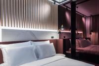 Posteľ alebo postele v izbe v ubytovaní Pod Zidom Rooms