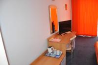 TV a/nebo společenská místnost v ubytování Hotel BelleVille