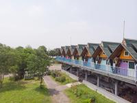 an overhead view of a row of houses with roofs at Kitefarm in Dongshan
