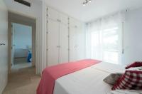Postel nebo postele na pokoji v ubytování Charming 2 Bedroom Trocadero Arena area