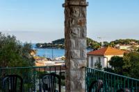 a room with a balcony with a view of the water at Villa Primavera Splendid villa with sea view in Saint-Jean Cap Ferrat in Saint-Jean-Cap-Ferrat