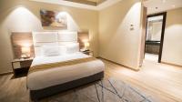 Postel nebo postele na pokoji v ubytování Golden Jewel Beach&Hotel