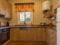 Kuchyňa alebo kuchynka v ubytovaní INNOUTHOME Gran villa con piscina torrent del pi