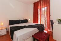 Postel nebo postele na pokoji v ubytování Casa Zorana-Alba Apartments