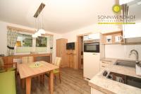 A kitchen or kitchenette at Pension Sonnwendhof
